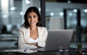 woman on laptop with a lead generation mindset
