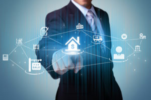 Real Estate business concept - Business Man touch icon on a touch screen interface