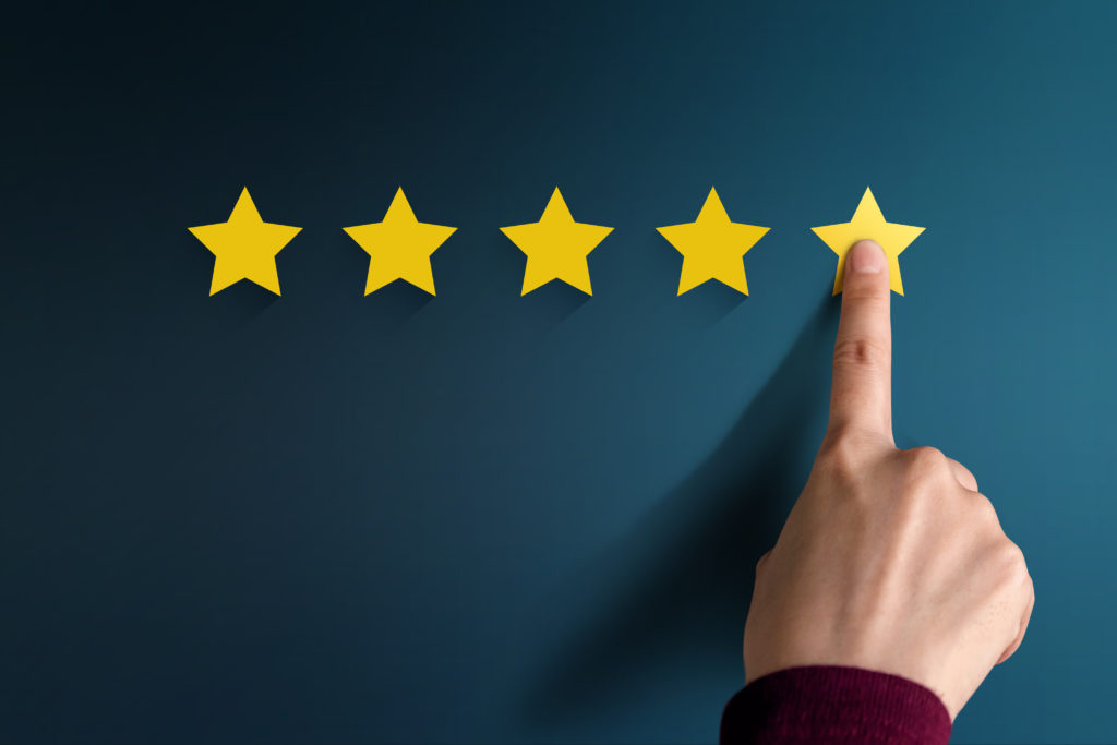 Five stars graphic with hand