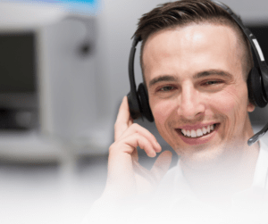 Customer service agent wearing headset smiling